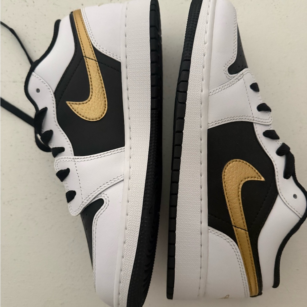 NEW Nike Jordan Low kids 6.5 (W8) Gold and black (sold out)